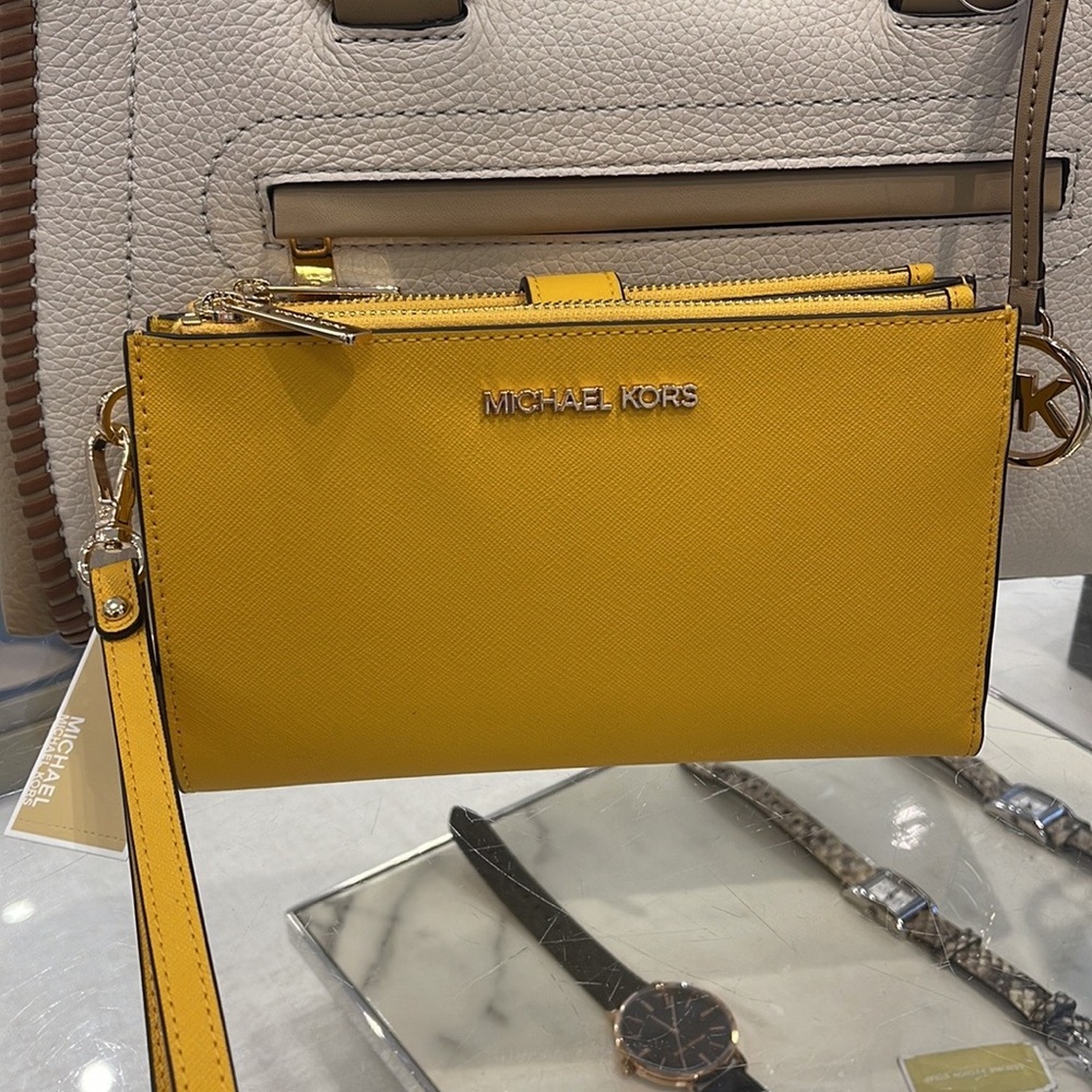 Michael Kors Jet Set Travel Large Double Zip Leather Wristlet phone holder 
NWT